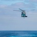 An MH-60S Sea Hawk Helicopter Prepares To Land On The Flight Deck Of USS Wayne E. Meyer