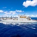 USS Arlington receives supplies from USNS Medgar Evers