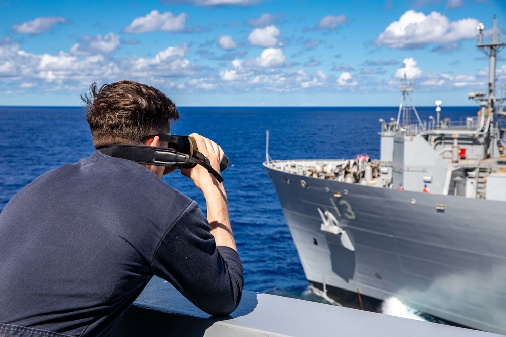 USS Arlington receives supplies from USNS Medgar Evers