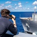 USS Arlington receives supplies from USNS Medgar Evers