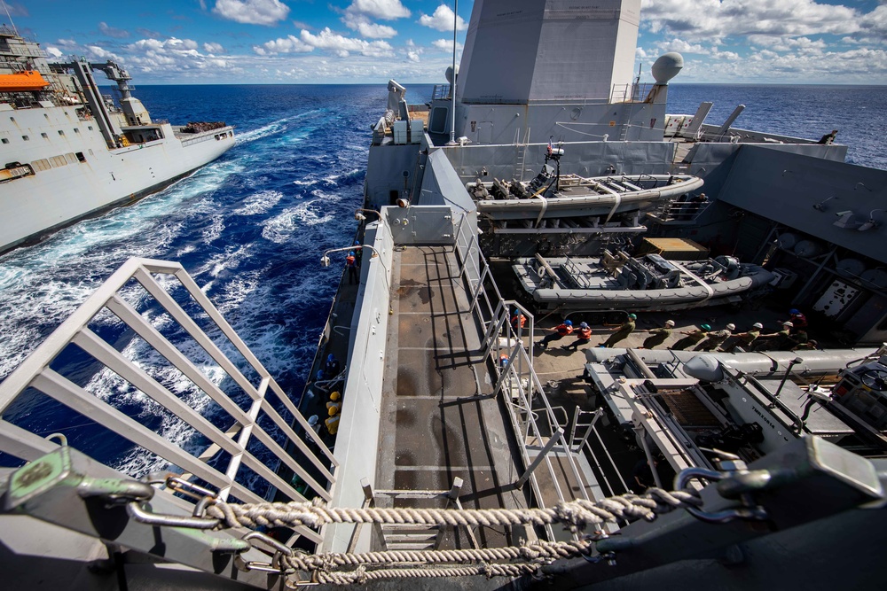 USS Arlington receives supplies from USNS Medgar Evers