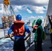 USS Arlington receives supplies from USNS Medgar Evers