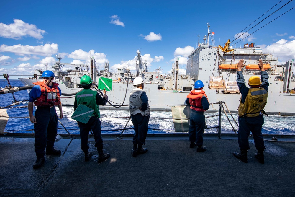 USS Arlington receives supplies from USNS Medgar Evers