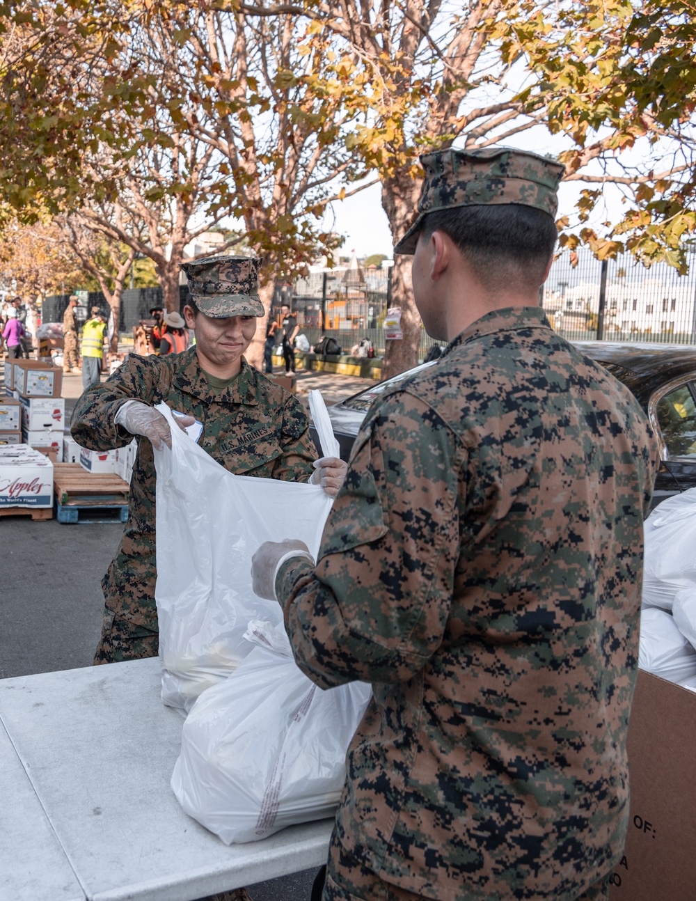 SF Fleet Week: Marines, Sailors prepare bags of food during Food Bank