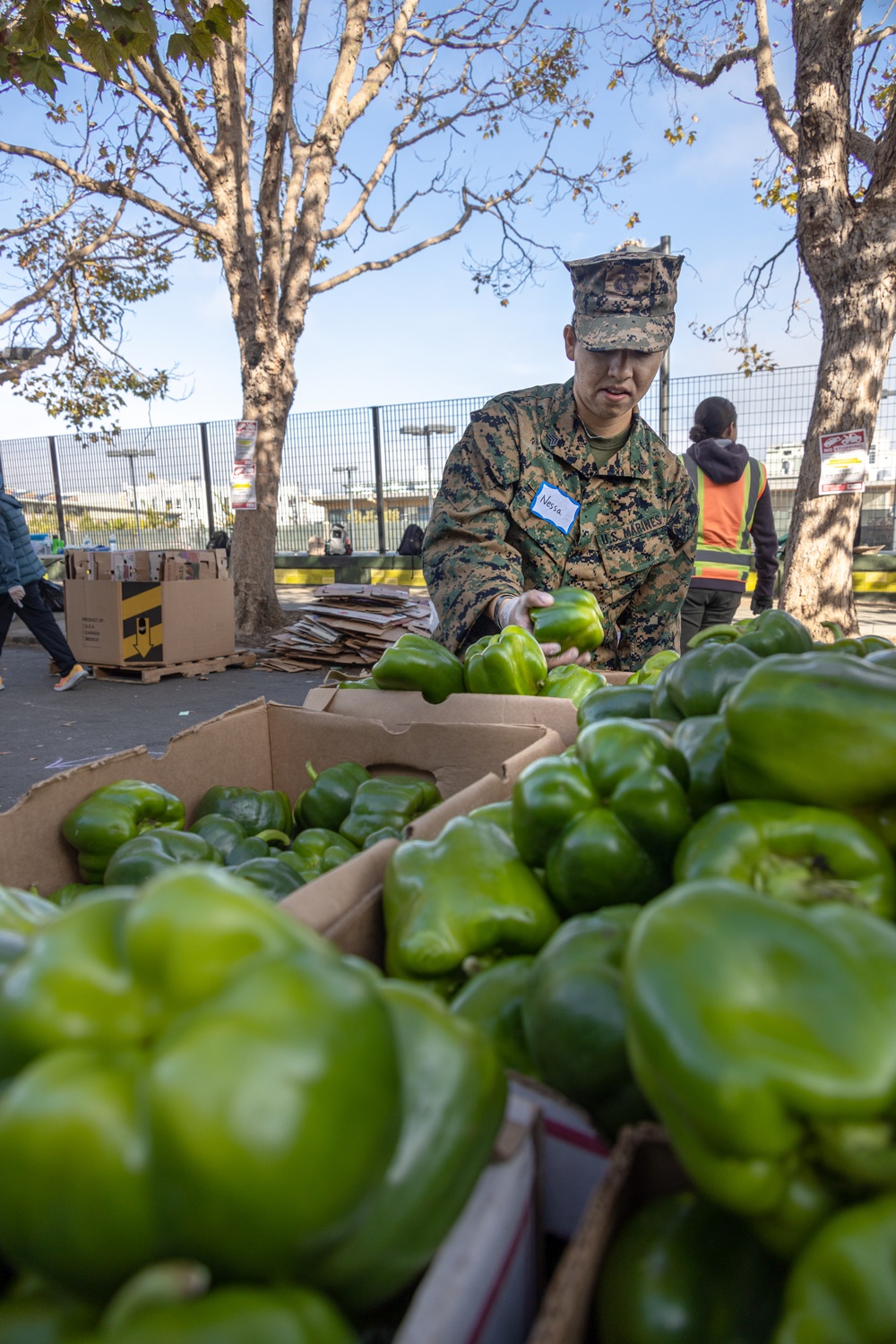 SF Fleet Week: Marines, Sailors prepare bags of food during Food Bank