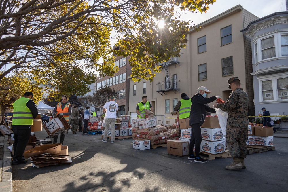 SF Fleet Week: Marines, Sailors prepare bags of food during Food Bank