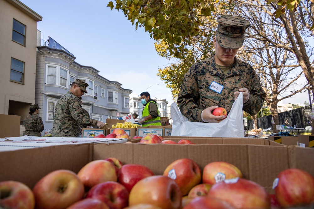 SF Fleet Week: Marines, Sailors prepare bags of food during Food Bank