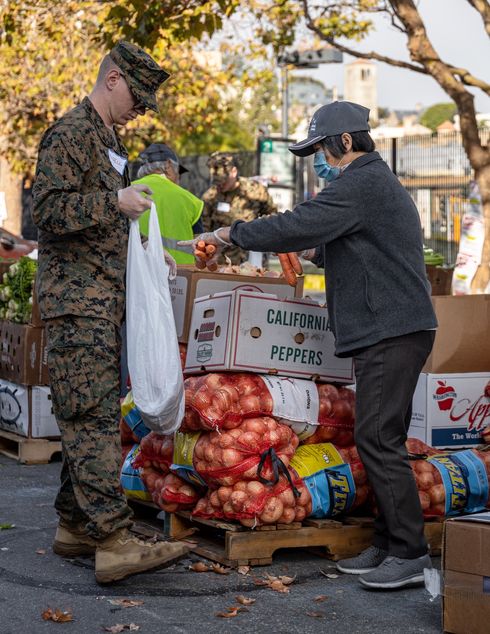 SF Fleet Week: Marines, Sailors prepare bags of food during Food Bank