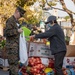 SF Fleet Week: Marines, Sailors prepare bags of food during Food Bank