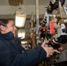 USS Ronald Reagan (CVN 76) Sailors in Primary Flight Control and below decks