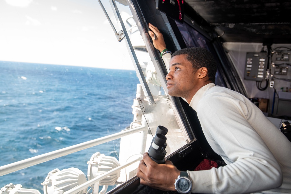 USS Ronald Reagan (CVN 76) Sailors in Primary Flight Control and below decks