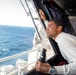 USS Ronald Reagan (CVN 76) Sailors in Primary Flight Control and below decks