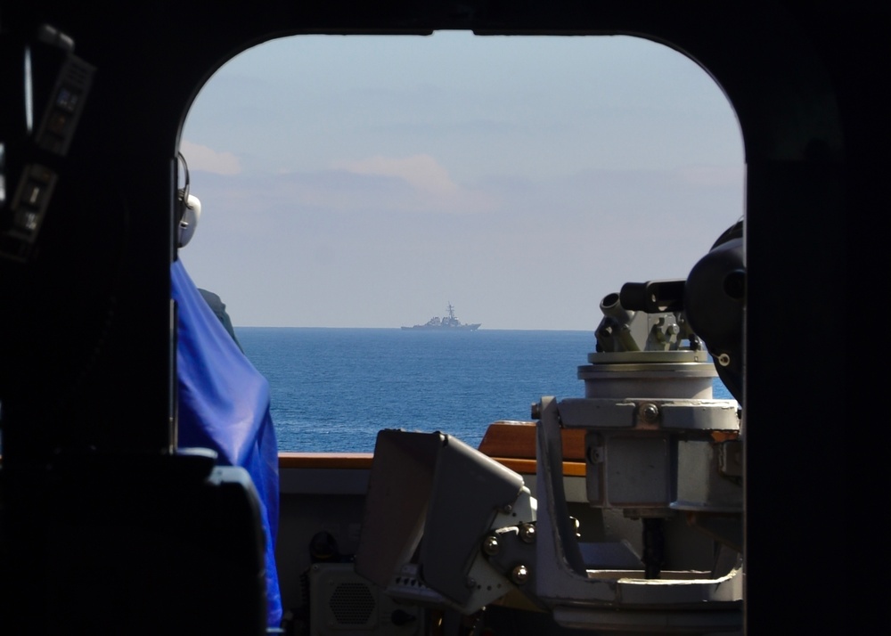 USS Wayne E. Meyer Steams In Line With Cruisers And Destroyers From Nimitz Carrier Strike Group