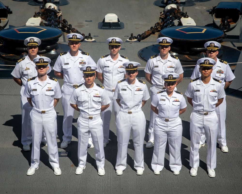 USS Arlington Sailors qualify as surface warfare officers