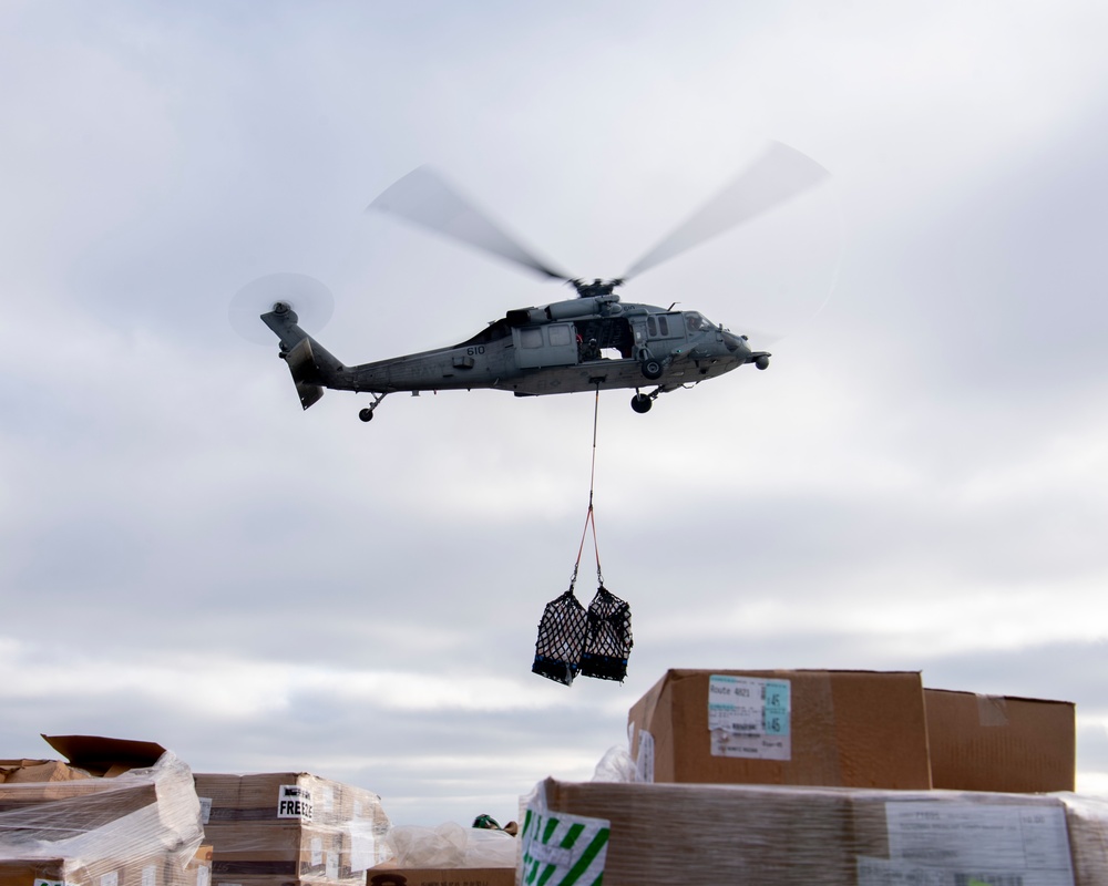 USS Nimitz Replinishes At Sea