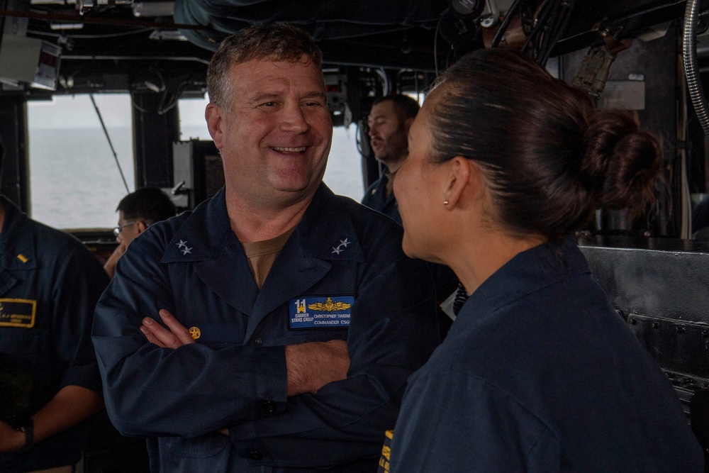 CSG11 Commander Talks with Finn Commanding Officer