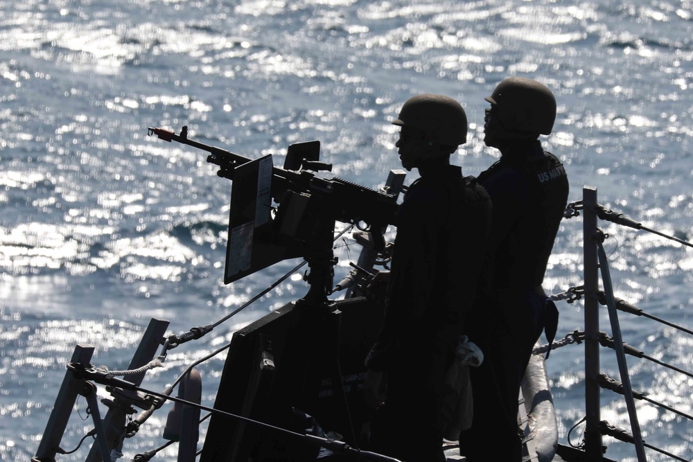 USS McFaul sailors man SCAT weapons