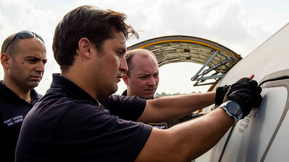 97th EARS train 39th CES Turkish firefighters on KC-135 emergency procedures