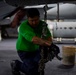 U.S. Navy Sailor Chains Down Aircraft