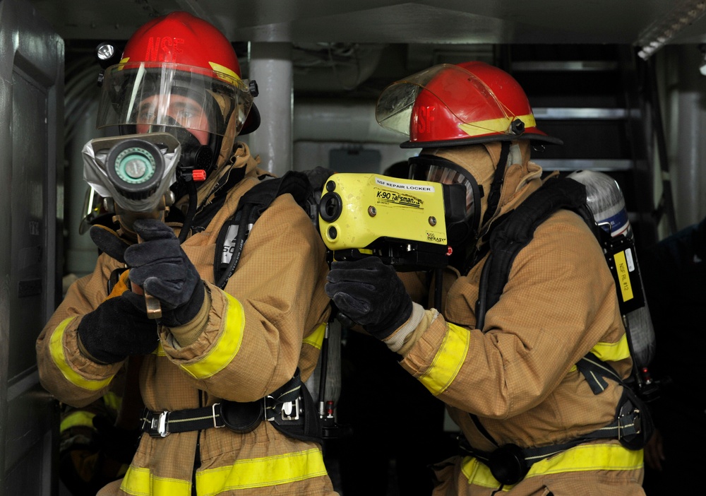 USS Frank Cable (AS 40) Conducts a Fire Drill