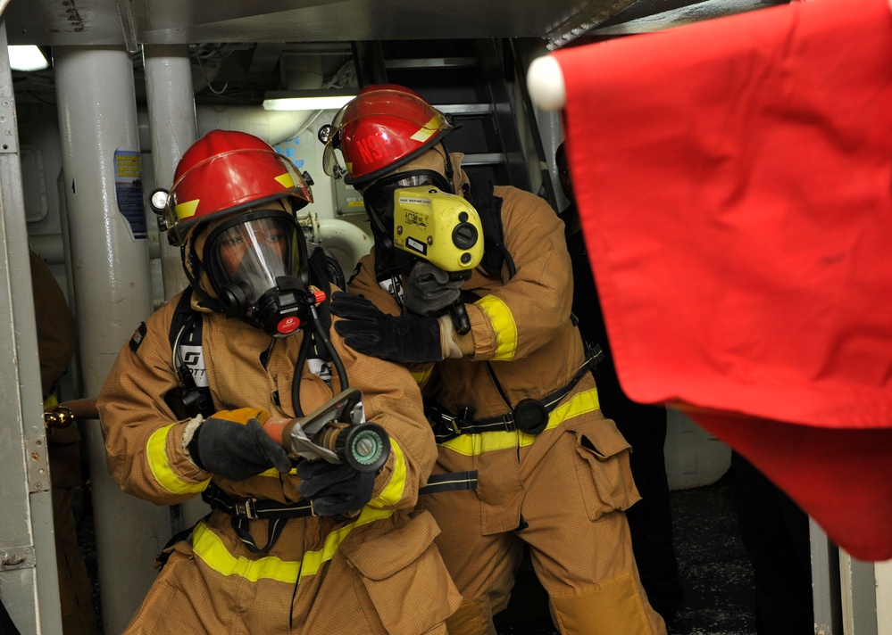 USS Frank Cable (AS 40) Conducts a Fire Drill