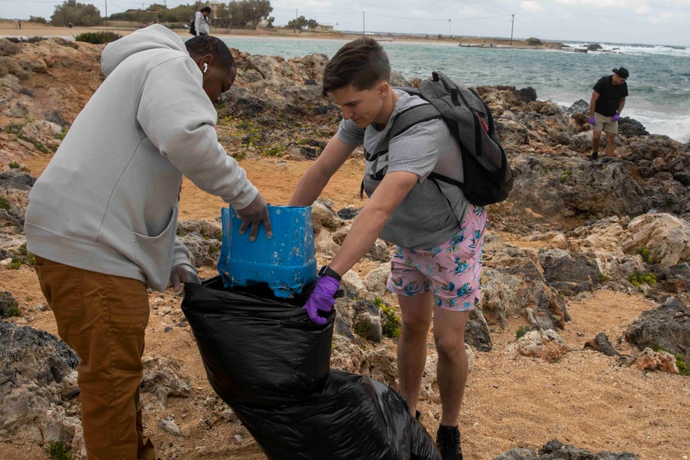 USS George H.W. Bush (CVN 77) Sailors participate in a community relations beach clean up