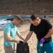 USS George H.W. Bush (CVN 77) Sailors participate in a community relations beach clean up