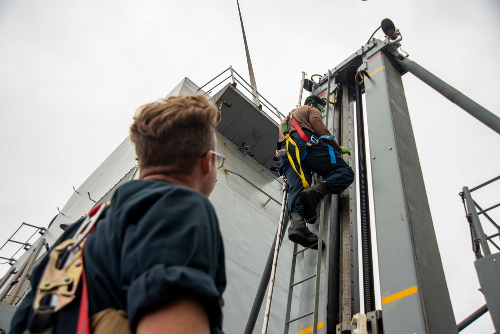 U.S. Navy Seaman Conducts Maintenance