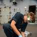 U.S. Navy Seaman Conducts Maintenance