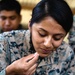 U.S. Marines feast on roasted pork served by Philippine Marines