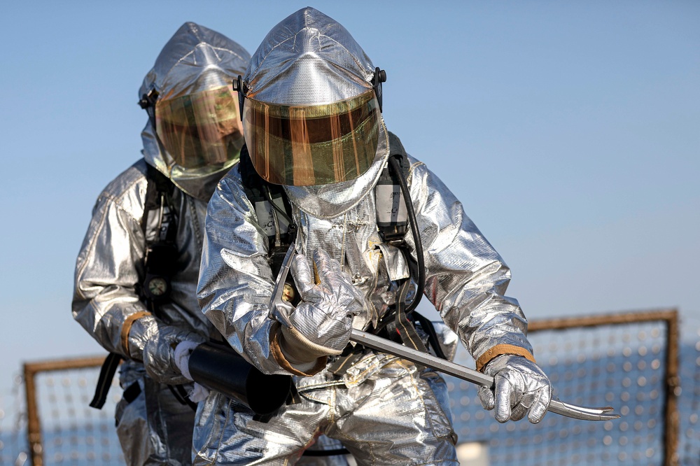 USS Barry (DDG 52) Sailors Conduct a Fire Drill on the Ship's Flight Deck