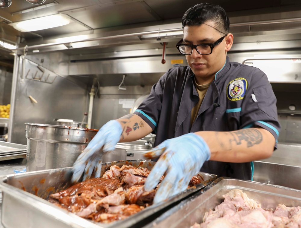 USS Barry (DDG 52) Sailors Prepare Food in the Galley While Operating in the Philippine Sea