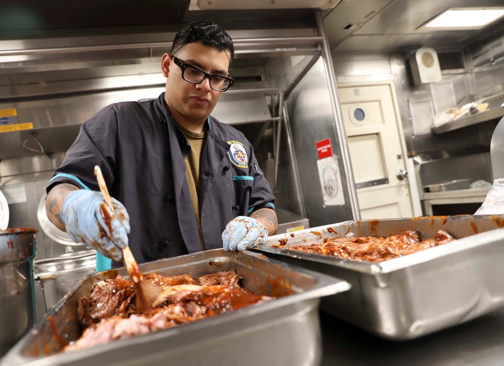 USS Barry (DDG 52) Sailors Prepare Food in the Galley While Operating in the Philippine Sea