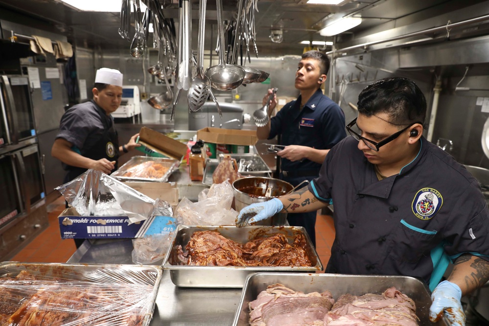 USS Barry (DDG 52) Sailors Prepare Food in the Galley While Operating in the Philippine Sea