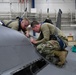 Aircraft Armament Systems specialists remove gun