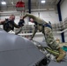 Aircraft Armament Systems specialists remove gun