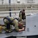 Aircraft Armament Systems specialists remove gun