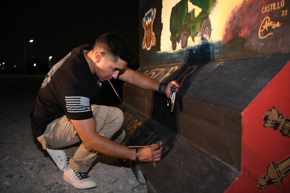 The Art in War - U.S. Army Sgt. Anthony Castillo Paints 10th Mural at ADAB