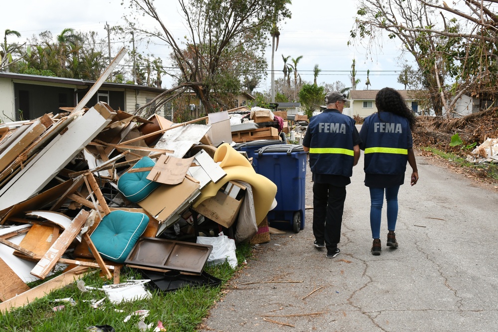 FEMA Disaster Survivor Assistance Team Go Through Impacted by Hurricane Ian