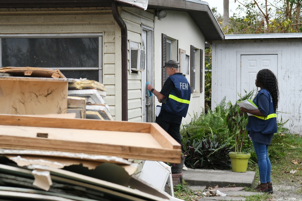 FEMA Disaster Survivor Assistance Team Go Through Impacted by Hurricane Ian