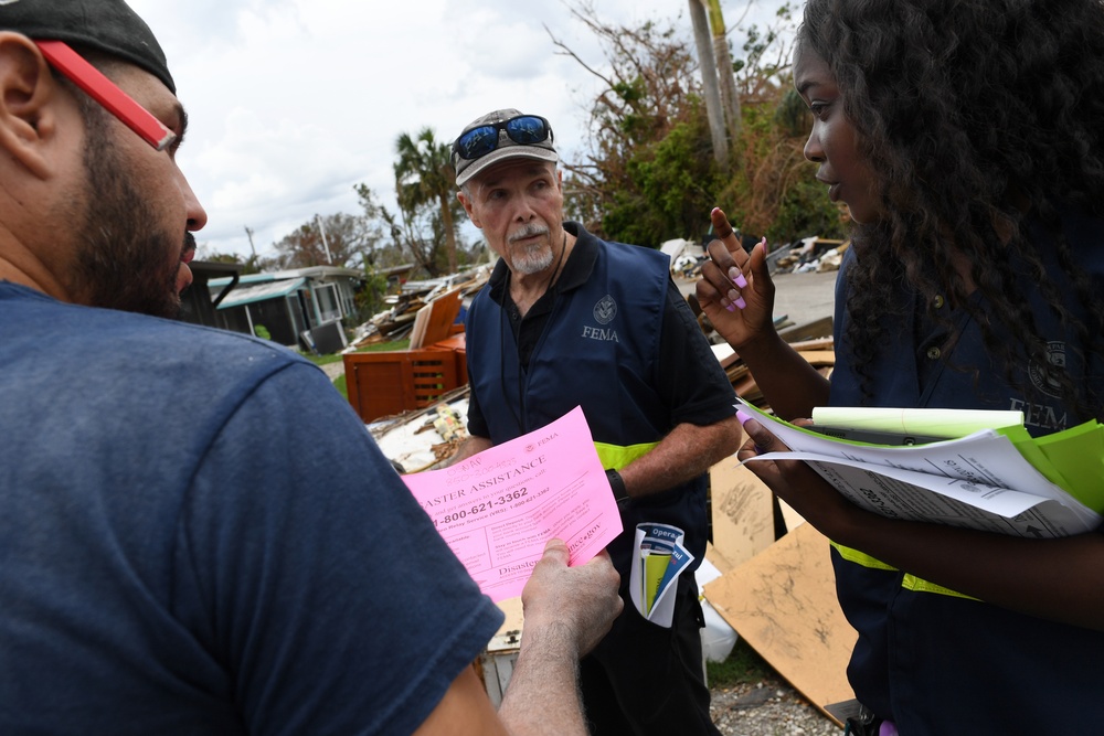 FEMA Disaster Survivor Assistance Team Members Helping Residents Apply for Assistance