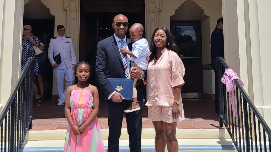 DLA Energy procurement analyst graduates Naval Postgraduate School