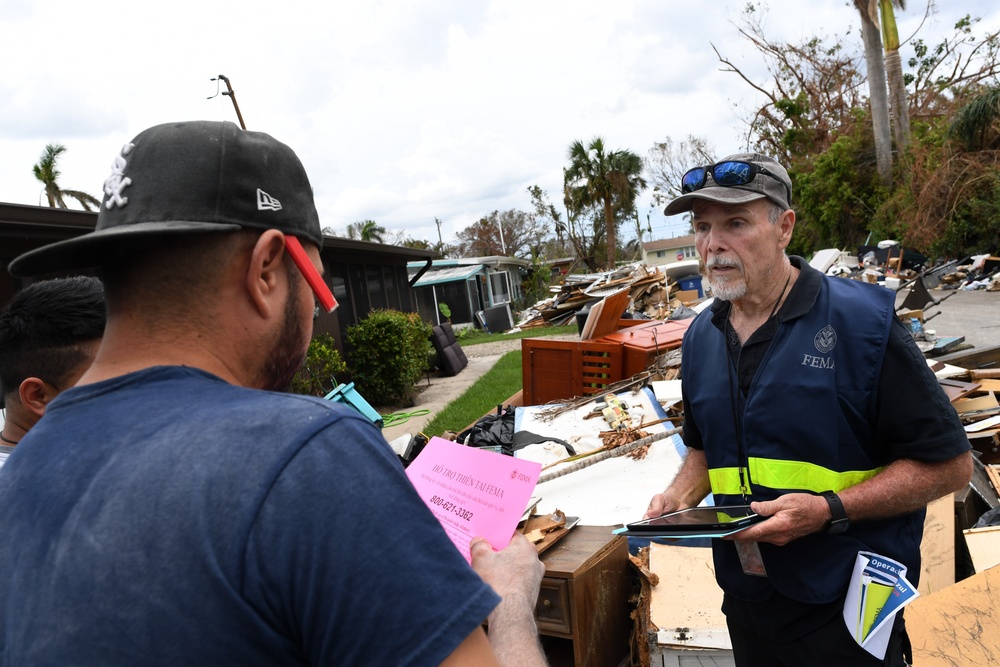 FEMA Disaster Survivor Assistance Team Members Helping Residents Apply for Assistance