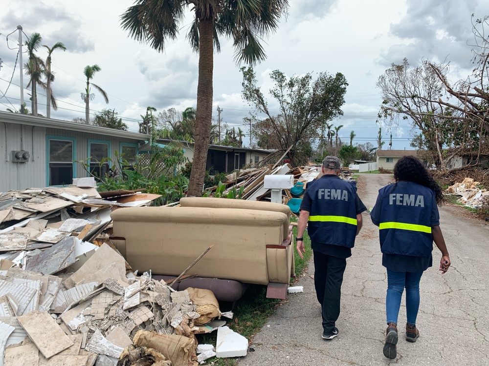 FEMA Disaster Survivor Assistance Team Go Through Neighborhood Impacted by Hurricane Ian