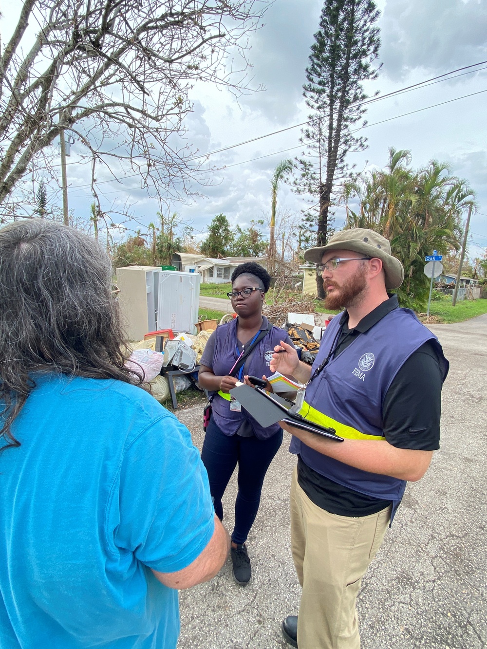 FEMA Disaster Survivor Assistance Team Members Helping Residents Apply for Assistance