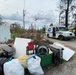 A US Postal Truck Delivers Mail in a Neighborhood Impacted by Hurricane Ian