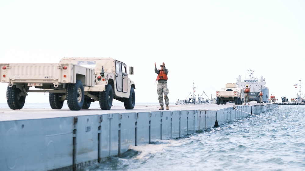 Transporters assigned to the 597th Transportation Brigade support 7th Transportation Brigade during JLOTs