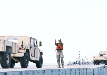 Transporters assigned to the 597th Transportation Brigade support 7th Transportation Brigade during JLOTs