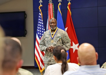 Bilingual Black Hawk instructor pilot achieves 50-year milestone in government service