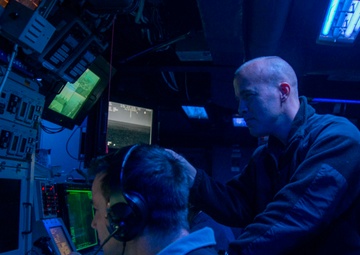 U.S. Navy Officers In Combat Information Center